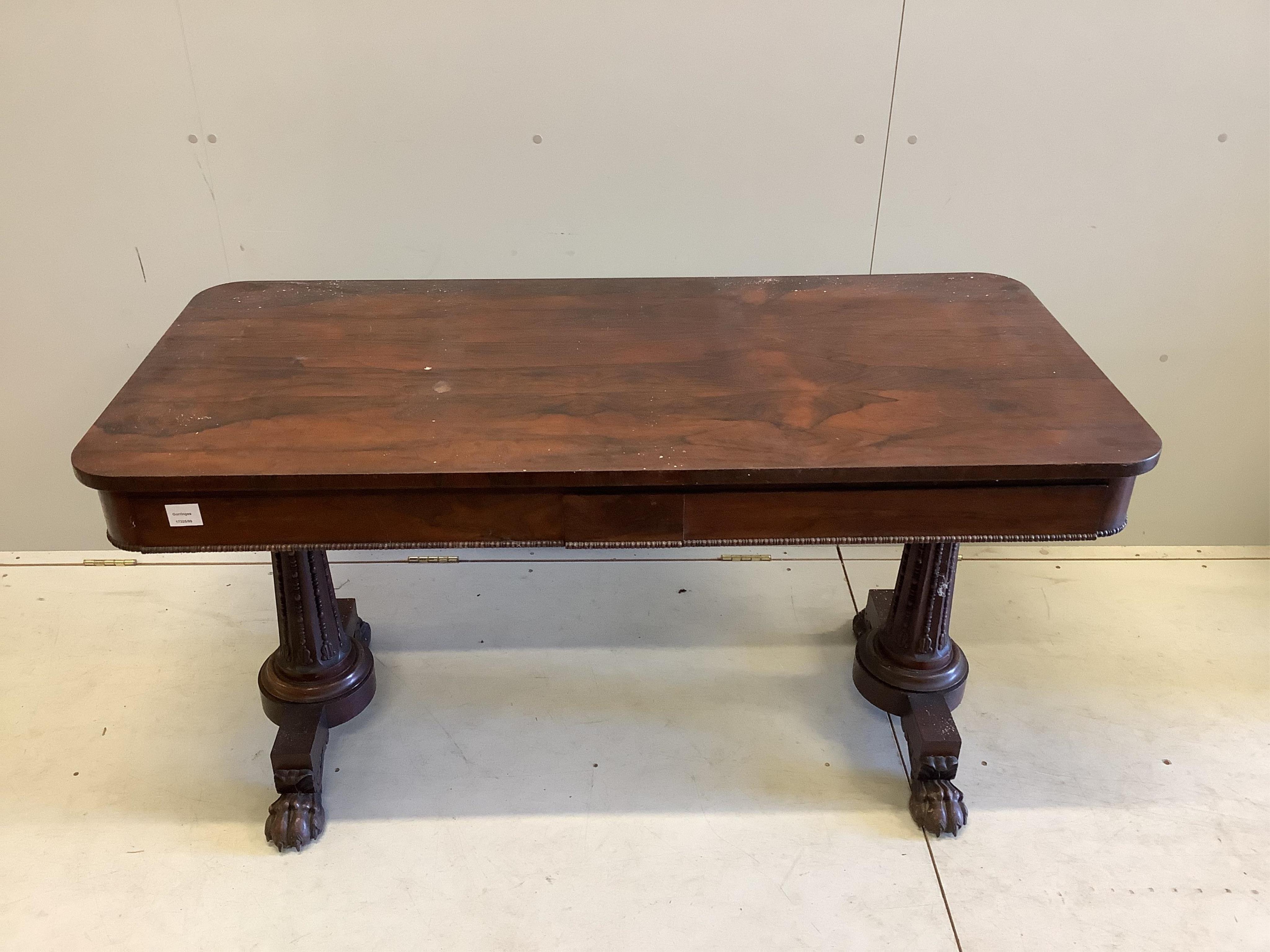 An early Victorian rosewood centre table, width 137cm, depth 64cm, height 72cm. Condition - fair